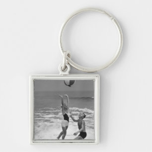 Couple Playing with a Beachball Key Ring