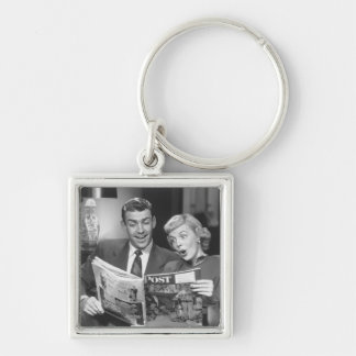 Couple Reading Magazine Key Ring