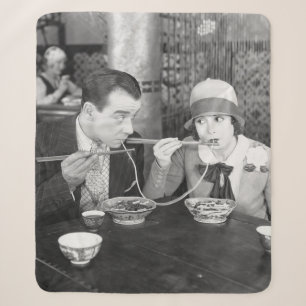 Couple sharing a noodle in a restaurantvintage, fo sherpa blanket