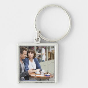 Couple sitting in a restaurant, Paris, 2 Key Ring