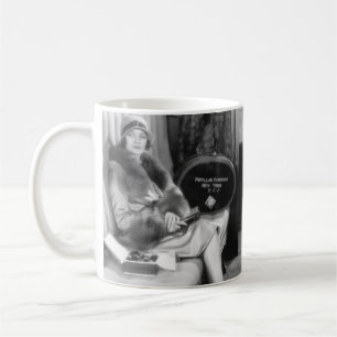 Couple sitting together in a compartment of a trai coffee mug