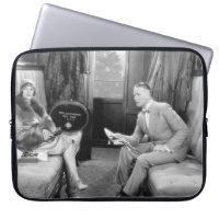 Couple sitting together in a compartment of a trai