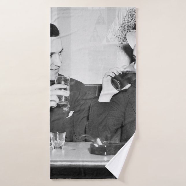 Couple sitting together in a restaurant flirting w bath towel (Bath Towel)