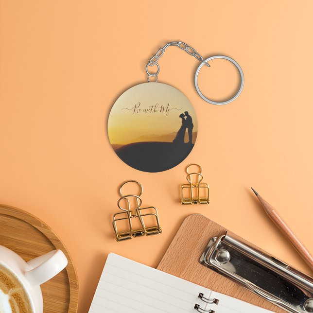 Couple standing during sunset keychain. keychain (Couple standing during sunset keychain. keychain
)