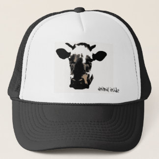 Cow animal inside trucker hat