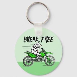 Cow riding a green motor cross bike key ring