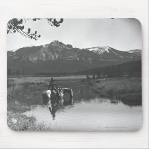 Cowboy and horse in a pond mouse mat
