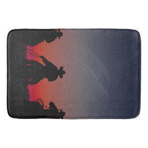 cowboy at sunset bath mat