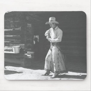 Cowboy eating from a Peter Pan peanutbutter can. Mouse Mat