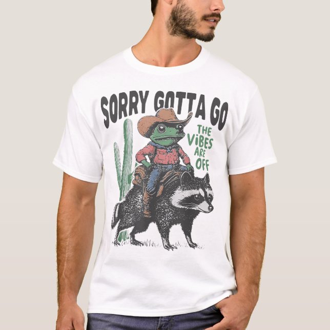 Cowboy Frog Riding Racoon The Vibes Are Off Weird T-Shirt (Front)