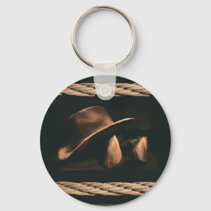 Cowboy hat, boots and rope western style masculine key ring