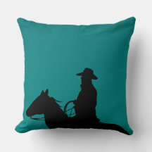 Cowboy & horse silhouette on teal-green background
