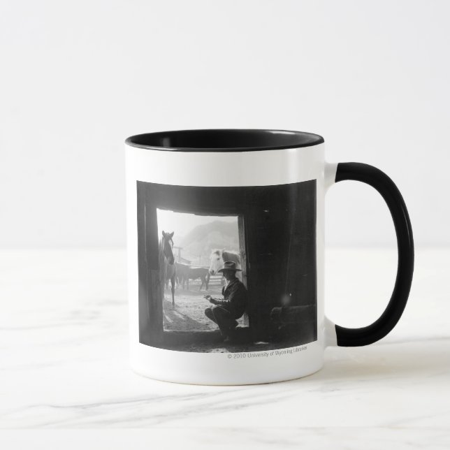 Cowboy in a doorway with horses mug (Right)