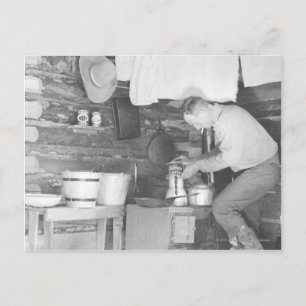 Cowboy making coffee inside the bunkhouse postcard