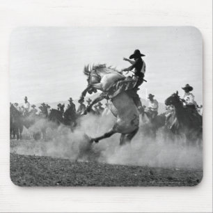 Cowboy on a bucking bronco mouse mat