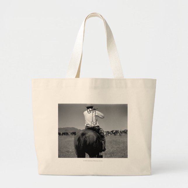 Cowboy on a horse with two brands. large tote bag (Front)
