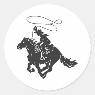Cowboy on bucking horse running with lasso classic round sticker