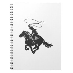 Cowboy on bucking horse running with lasso notebook