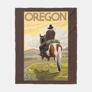 Cowboy on Horseback Vintage Travel Poster Fleece Blanket