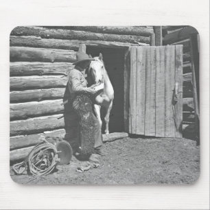 Cowboy reading a letter mouse mat