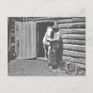 Cowboy reading a letter. postcard