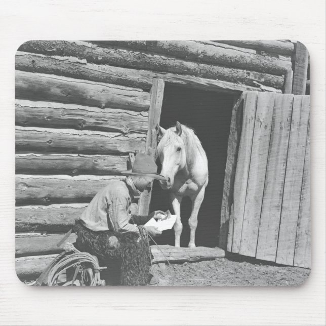 Cowboy reading a letter with a horse mouse mat (Front)
