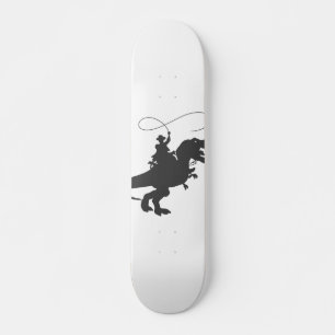 Cowboy riding dinosaur in the prehistoric era skateboard