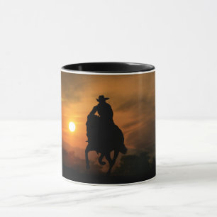 Cowboy Riding Horse at Sunset Mug