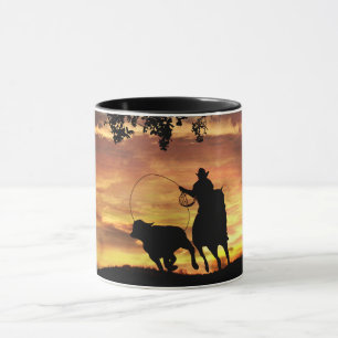 Cowboy Roping Steer at Sunset Mug