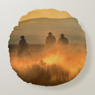 Cowboy Trio: Mountainous Background Gallop. Round Cushion