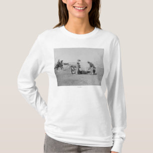 Cowboys Branding a Calf PhotographSouth Dakota T-Shirt