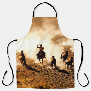 Cowboys chasing wilding horses. roping and riding, apron