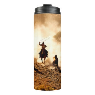 Cowboys chasing wilding horses. roping and riding, thermal tumbler