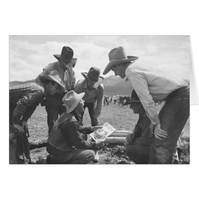 Cowboys looking at a magazine (Front Horizontal)