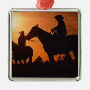 cowboys on horses Christmas ornament