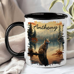 Coyote at Sunrise Lake Reflection Mug<br><div class="desc">Start your day with the wild beauty of the Coyote at Sunrise Lake Reflection Mug. This stunning mug features a majestic coyote standing by a serene lake at sunrise, with the tranquil forest and golden sky beautifully reflected in the water. Customised with your name, it adds a personal touch that...</div>
