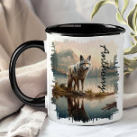 Coyote by Mountain Lake Reflection Mug<br><div class="desc">Start your morning with the captivating Coyote by Mountain Lake Reflection Mug. This unique mug features a stunning design of a coyote standing by a serene mountain lake, with the majestic peaks and tranquil water beautifully reflected in the lake. Customised with your name, it adds a special, personal touch. Perfect...</div>