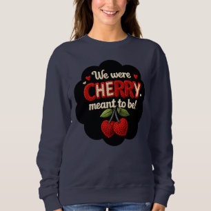 Cozy knitted-style typography and adorable cherry sweatshirt