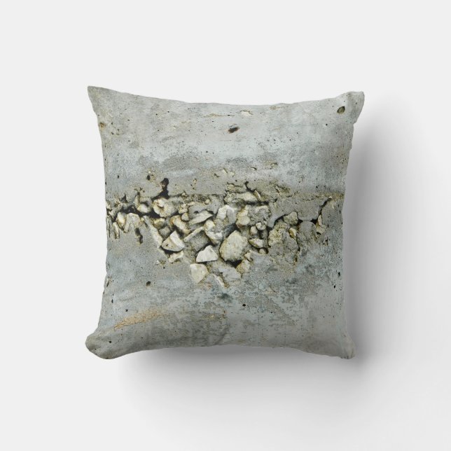 Cracked concrete wall with small stones cushion (Front)