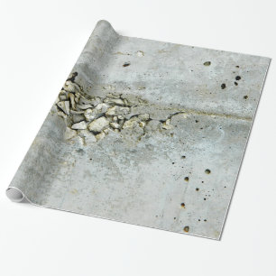 Cracked concrete wall with small stones wrapping paper