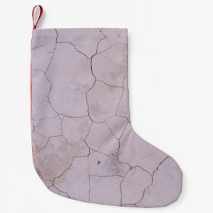 CRACKED WHITE CONCRETE FLOOR SMALL CHRISTMAS STOCKING