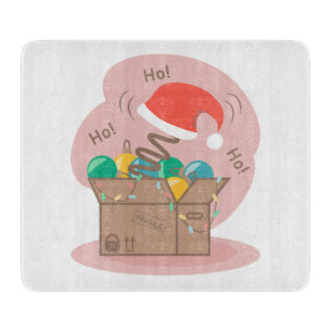 Craft box with Christmas decoration and Santa hat  Cutting Board