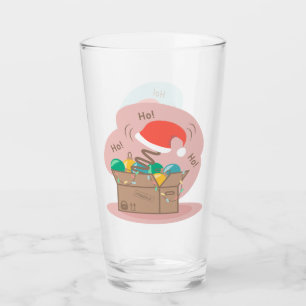 Craft box with Christmas decoration and Santa hat Glass