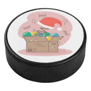 Craft box with Christmas decoration and Santa hat Hockey Puck