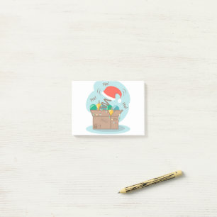 Craft box with Christmas decoration and Santa hat Post-it Notes