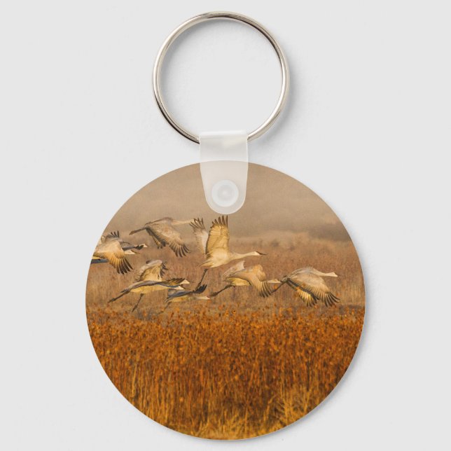 Cranes over a golden field key ring (Front)