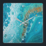 Crashing Wave Square Wall Clock<br><div class="desc">10.75” x 10.75” acrylic wall clock with an image of aqua,  blue and brown fluid art resembling a crashing wave. Turquoise orbs mark the 12,  3,  6 and 9 positions. See the entire Under the Sea Clock collection in the DÉCOR | Clocks section.</div>
