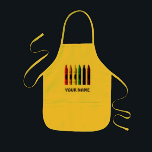 Crayons Name Crayon Kids Yellow Custom Apron<br><div class="desc">A graphic illustration of party crayons by artist/designer Charmaine Paulson on a Kids custom art apron. ©2015charmainepaulson</div>