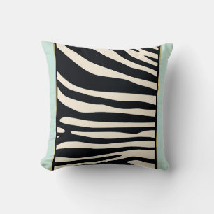 Cream, black, and mint green zebra print cushion