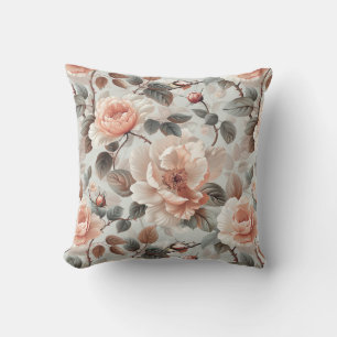Cream flowers with grey leaves on a light grey  cushion